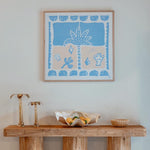 summer nights art print styled on wall above console table